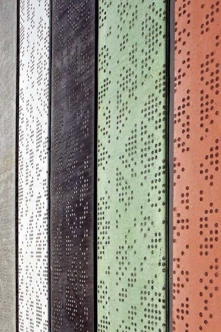 Patterned precast concrete facade panels on a completed building envelope
