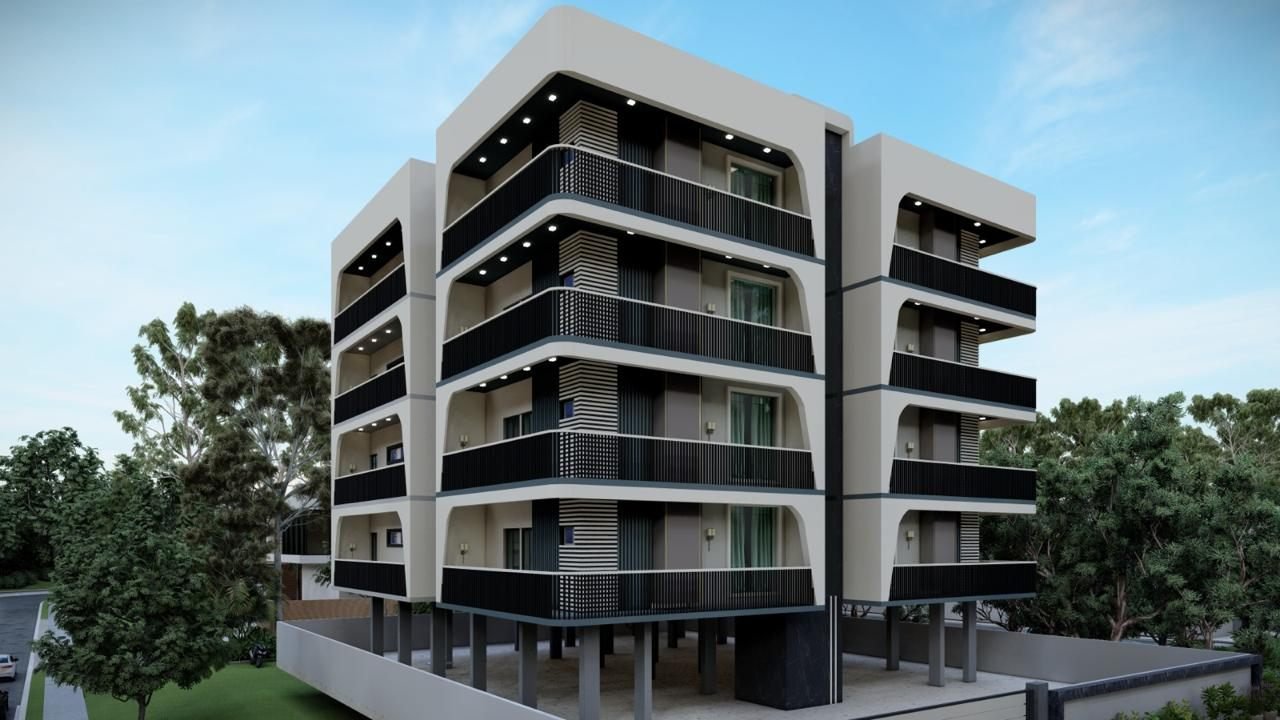 Contemporary residential apartment block exterior with dark louvre screens and white frames